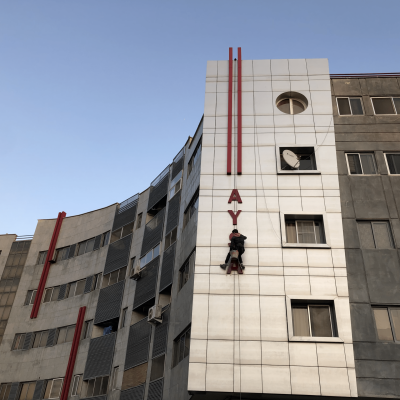 شستشوی نمای ساختمان - نمای ساختمان - راپل چیست - شستشوی ساختمان - طنابکار